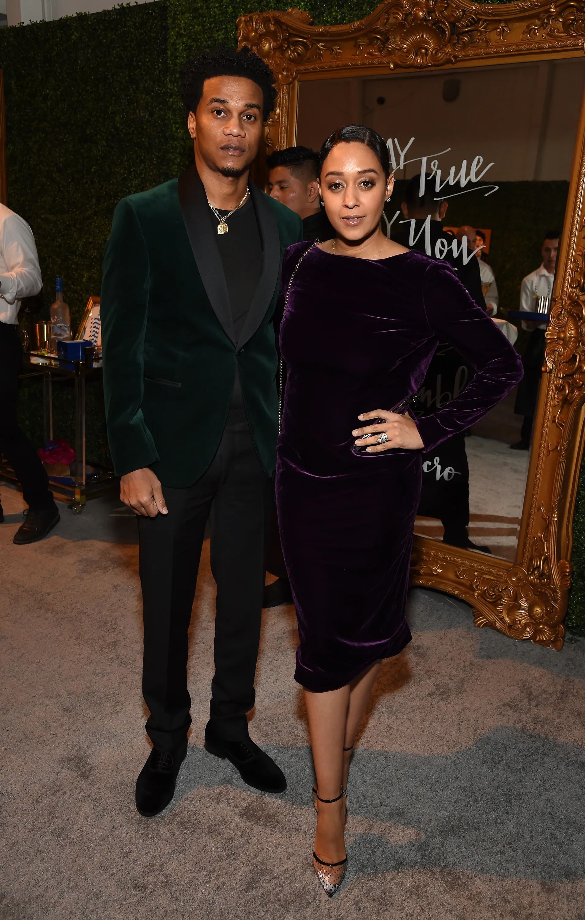 Cory Hardrict and Tia Mowry pose together at a pre-Oscars party.