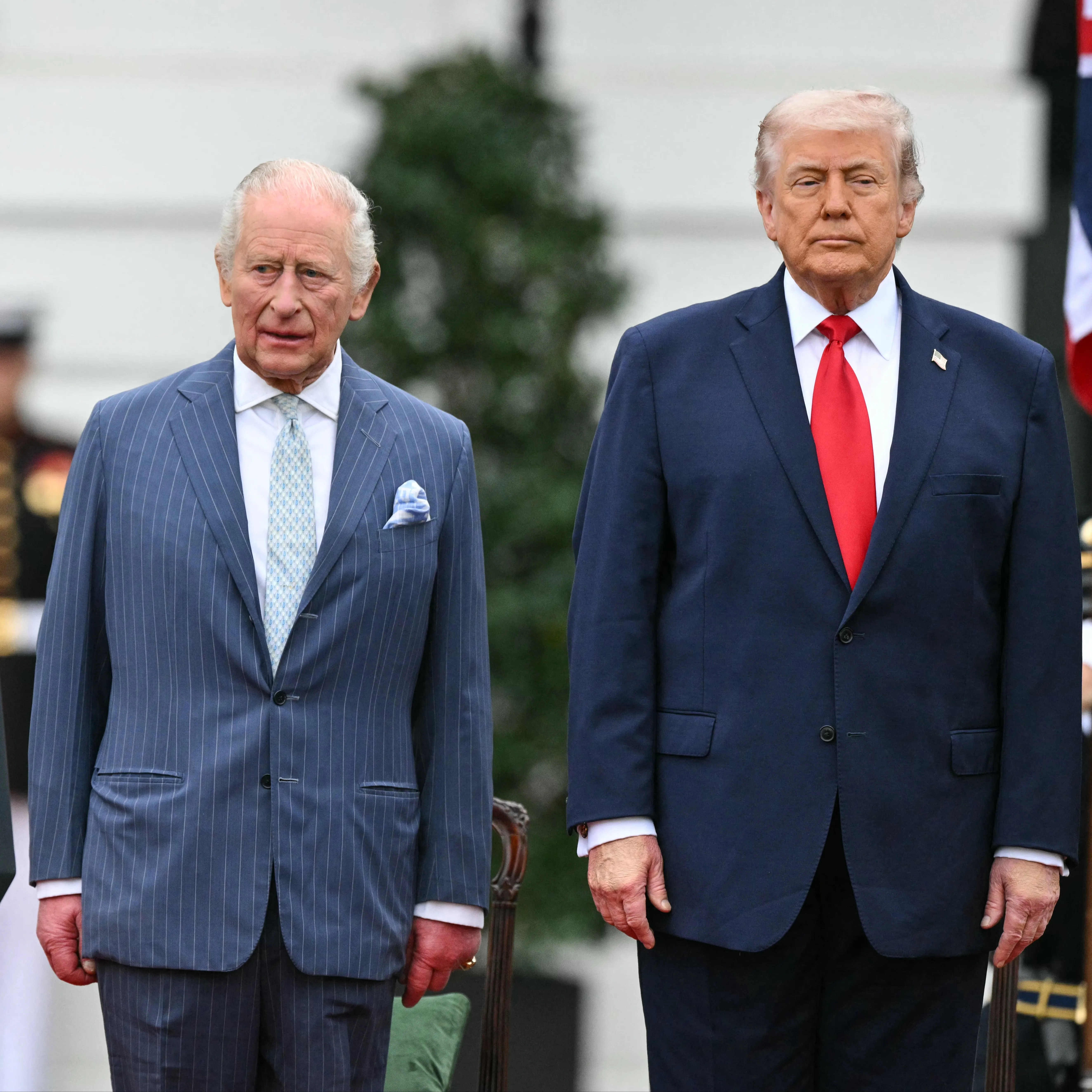 King Charles III and Donald Trump participate in an arrival ceremony.