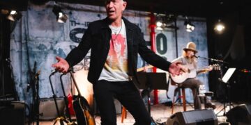 Tennis legend John McEnroe storms the stage during Linda Perry’s emotional show