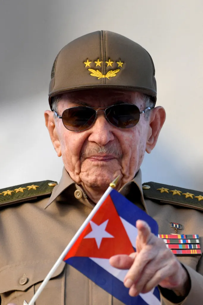 Raul Castro waves around a Cuban flag during a May Day festival on May 1, 2025.