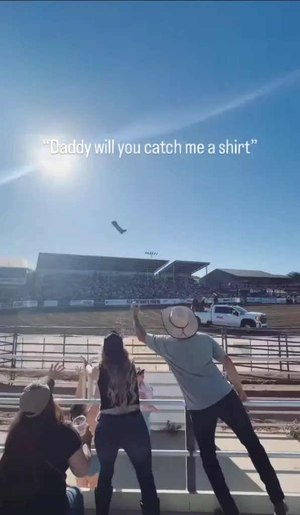 A t-shirt tossed into a crowd at a rodeo event, with text overlay 
