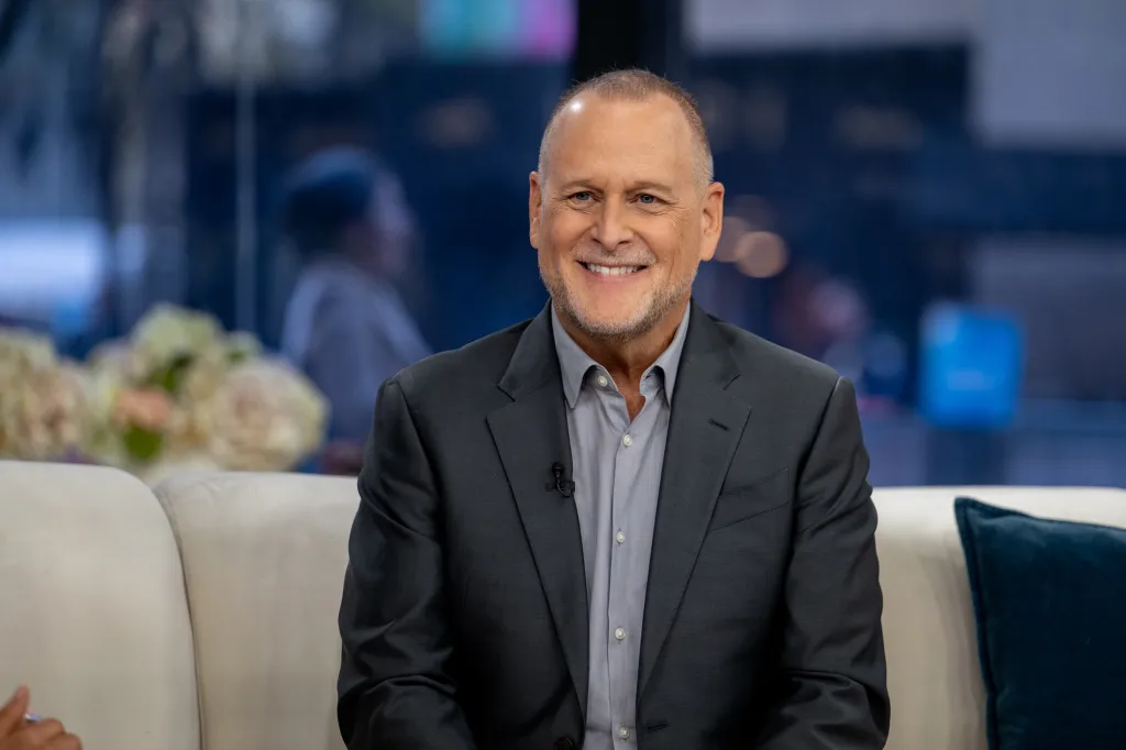 Dave Coulier smiling on the 