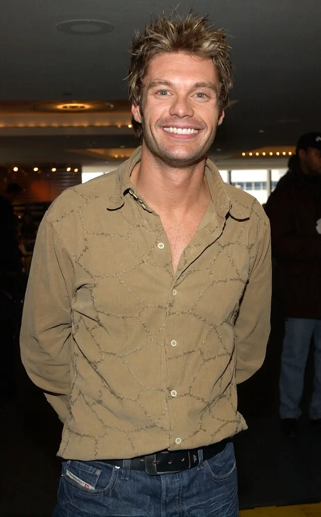Ryan Seacrest smiling at The 45th GRAMMY Awards.