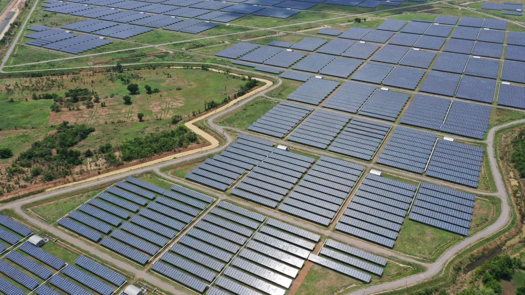 Aerial view of a large solar energy farm in Asia.