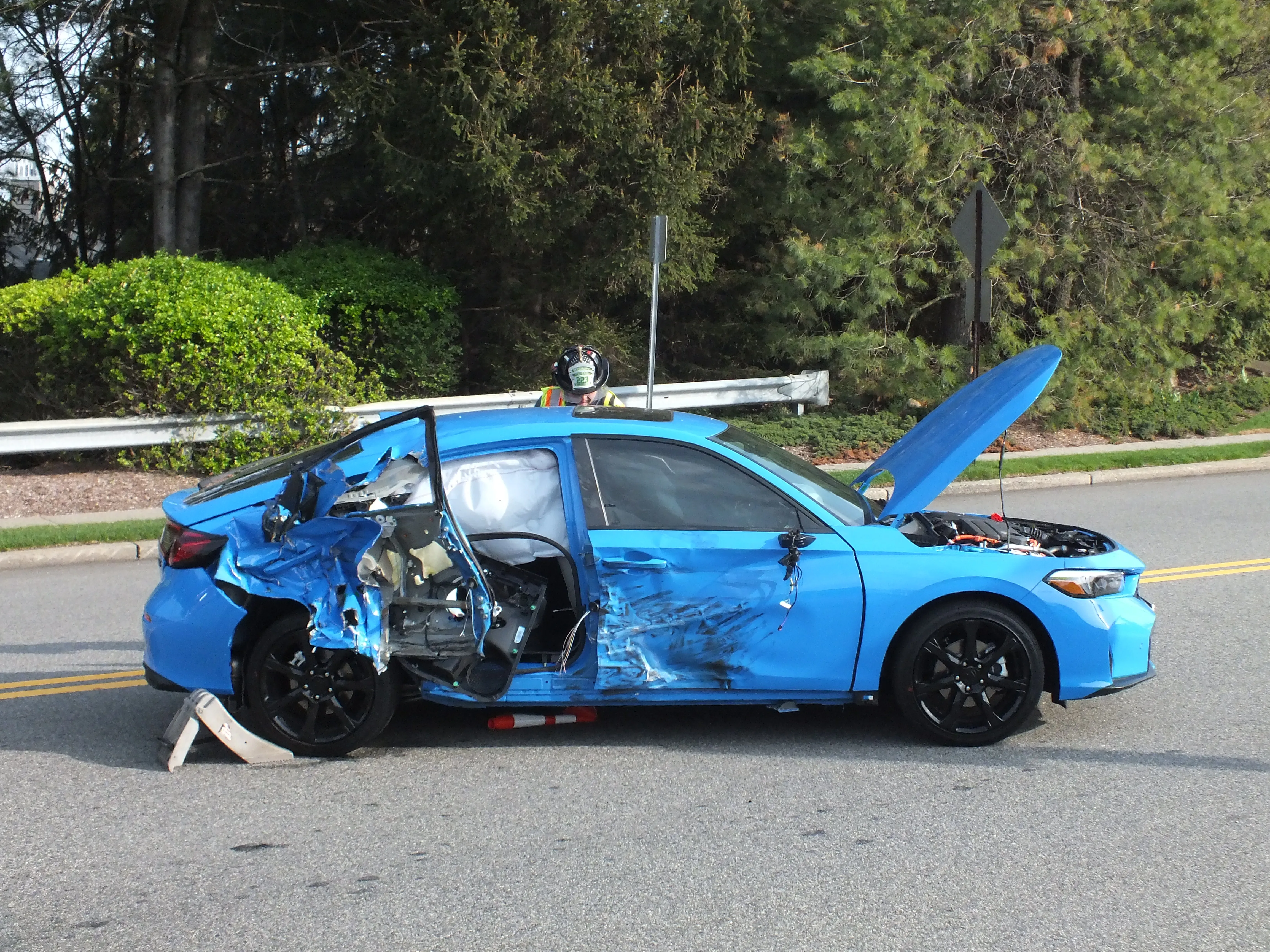 A wrecked car at the scene of an accident where Dianna Russini helped 