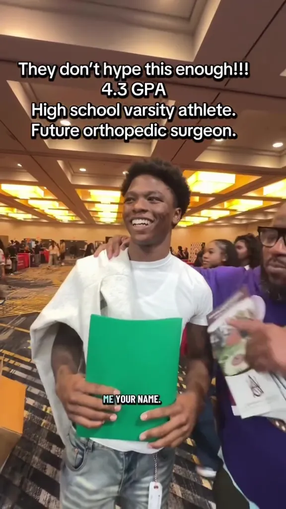 Dominic Antoine Jr., a young Black man, smiles while holding a green folder, with text describing him as a 4.3 GPA high school varsity athlete and future orthopedic surgeon.