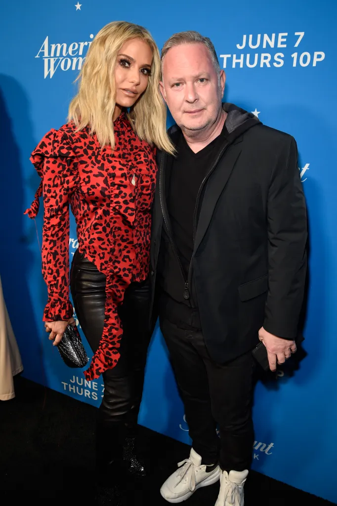 Dorit Kemsley and Paul Kemsley posing at the 