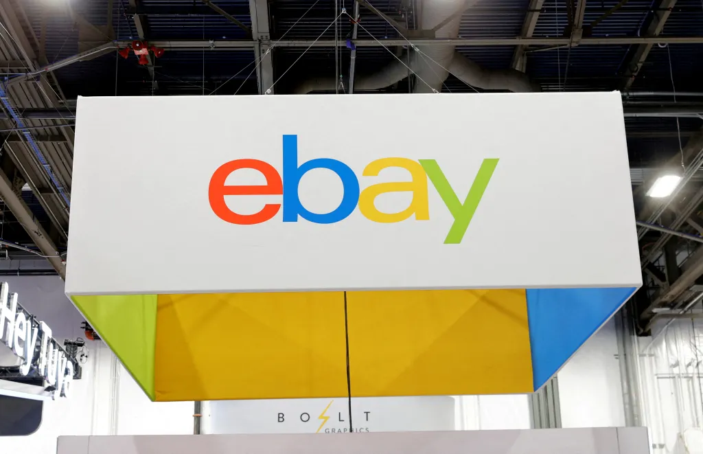 The eBay logo is displayed on a banner at a consumer electronics trade show.