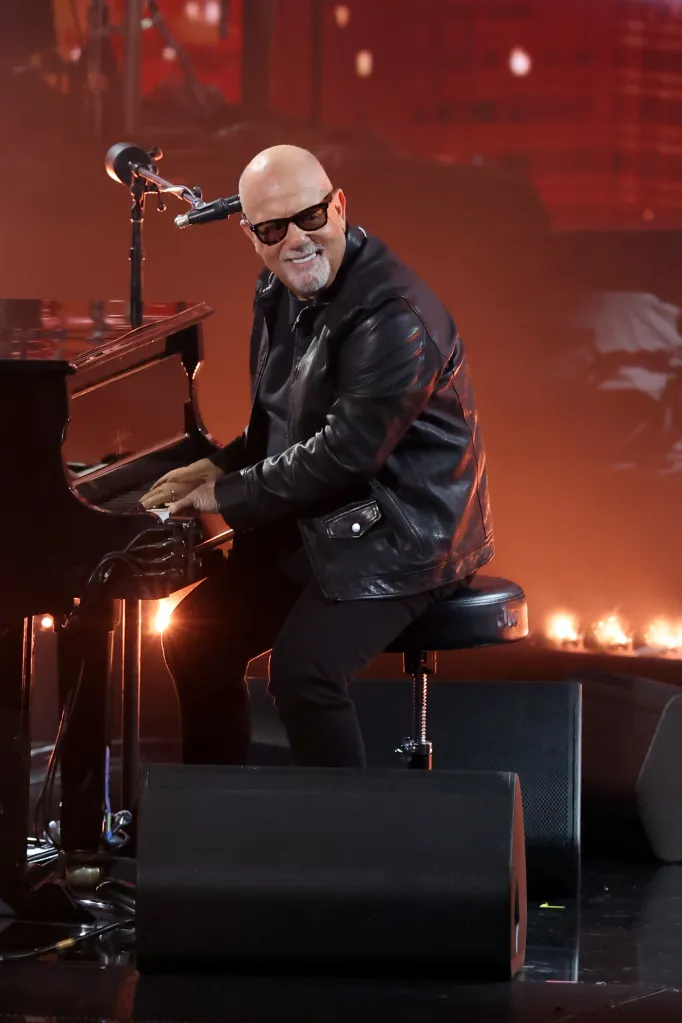 Billy Joel performing onstage at the 66th GRAMMY Awards.