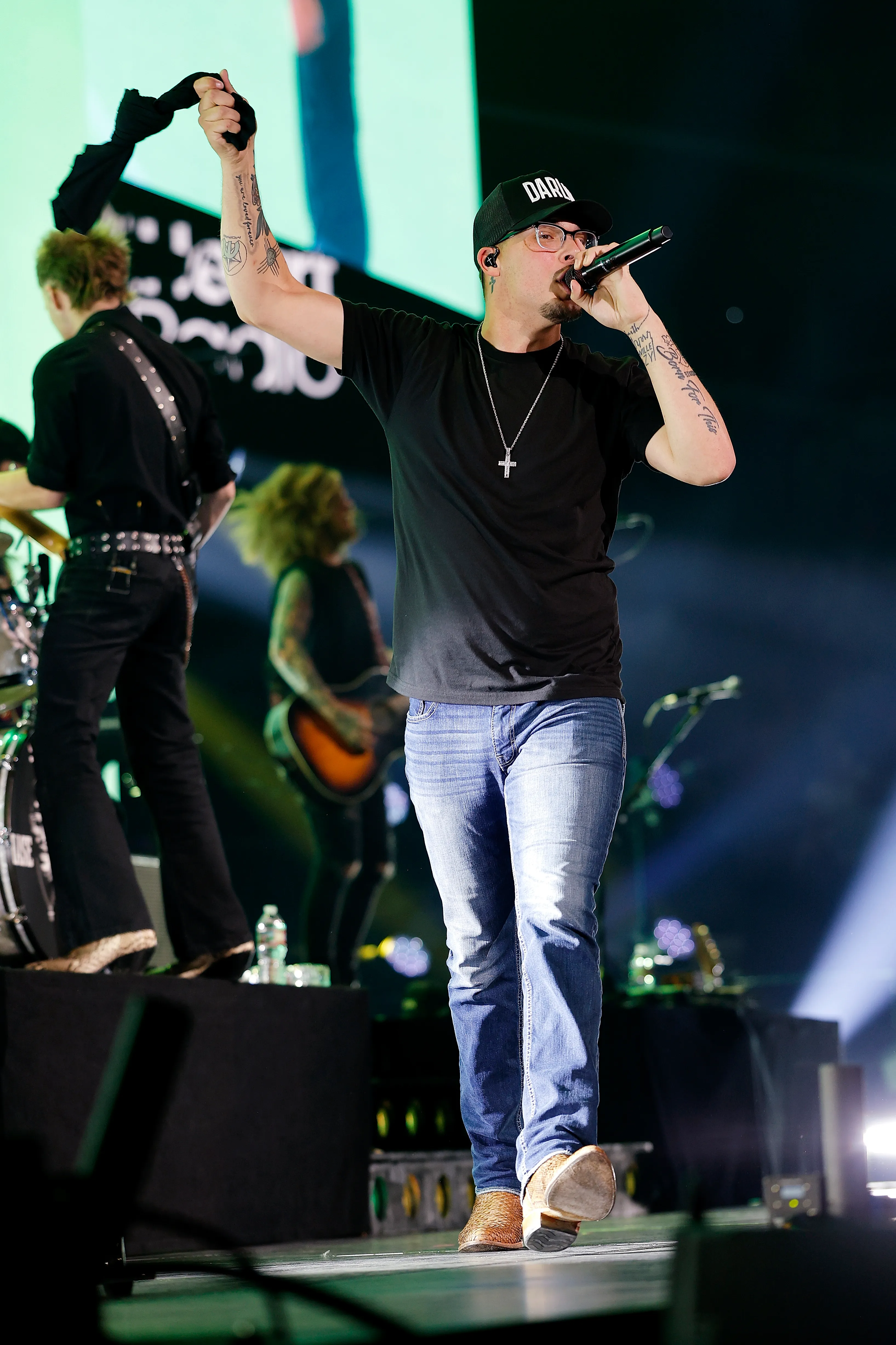 Chase Matthew performing onstage during the 2026 iHeartCountry Festival.