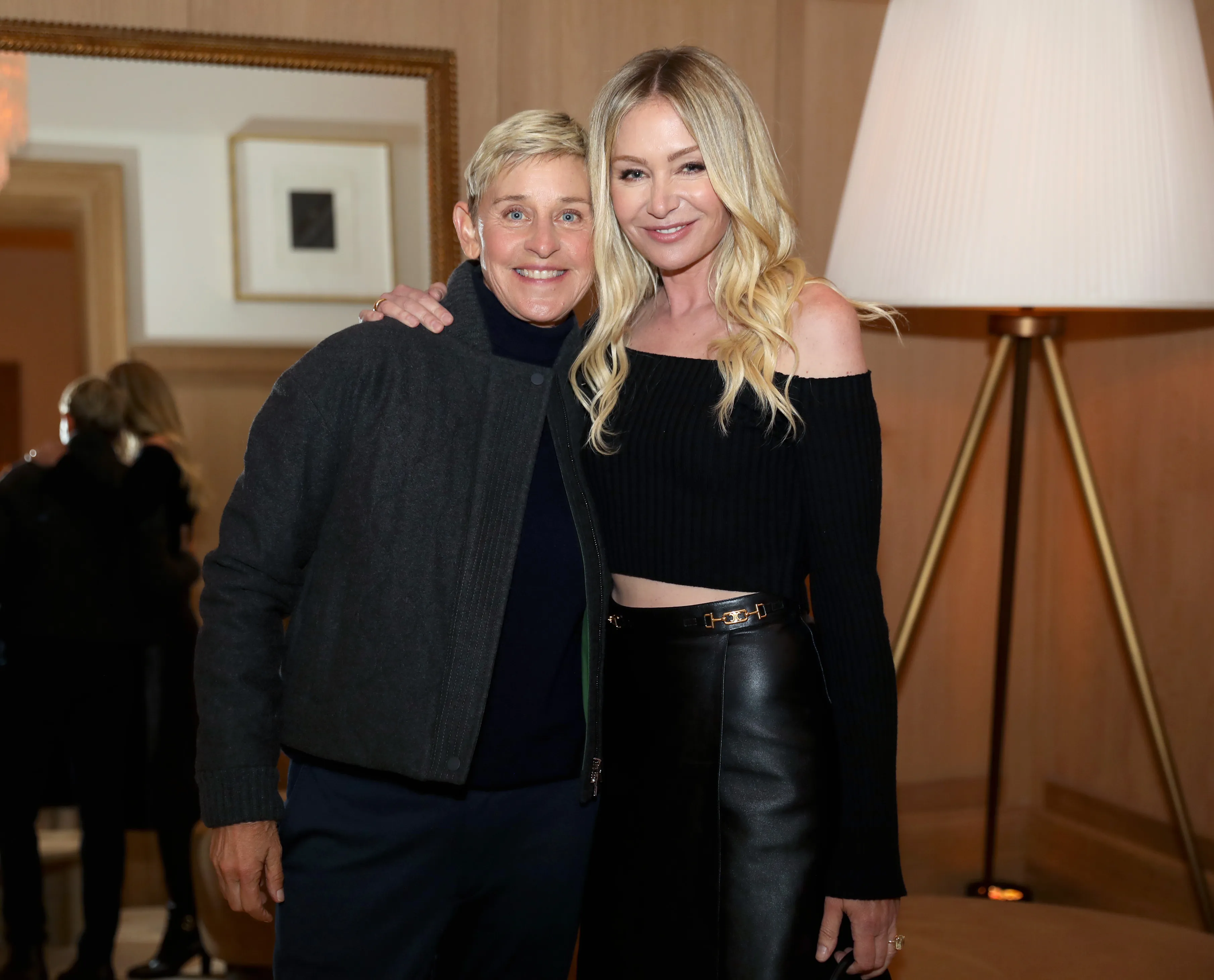 Ellen DeGeneres and Portia de Rossi posing for a photo.