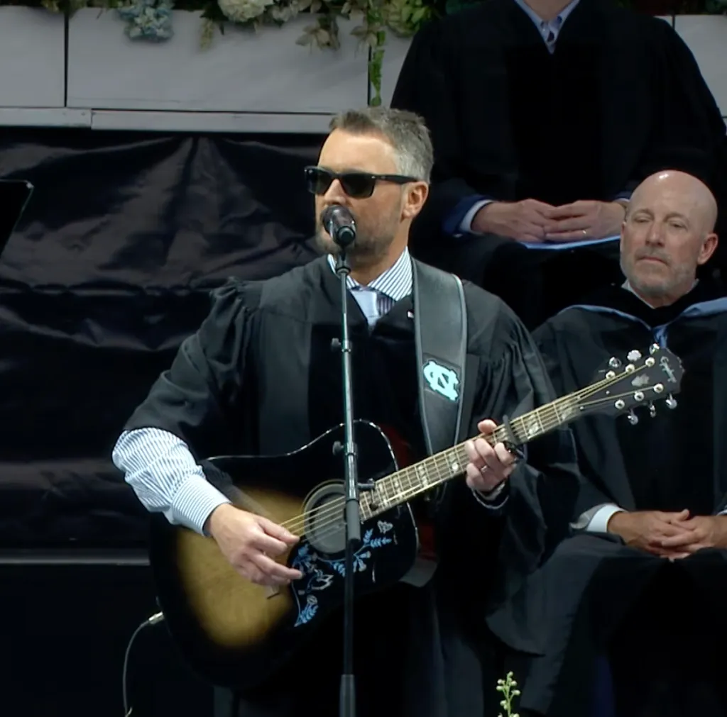 Church – armed with a Tar Heel-emblazoned guitar – dedicated his oration by giving a lesson on the instrument, at Kenan Memorial Stadium in Chapel Hill on May 9.