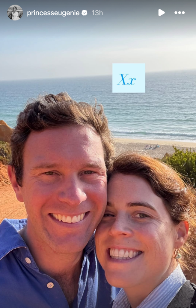 Princess Eugenie and Jack Brooksbank smiling together in front of a beach.