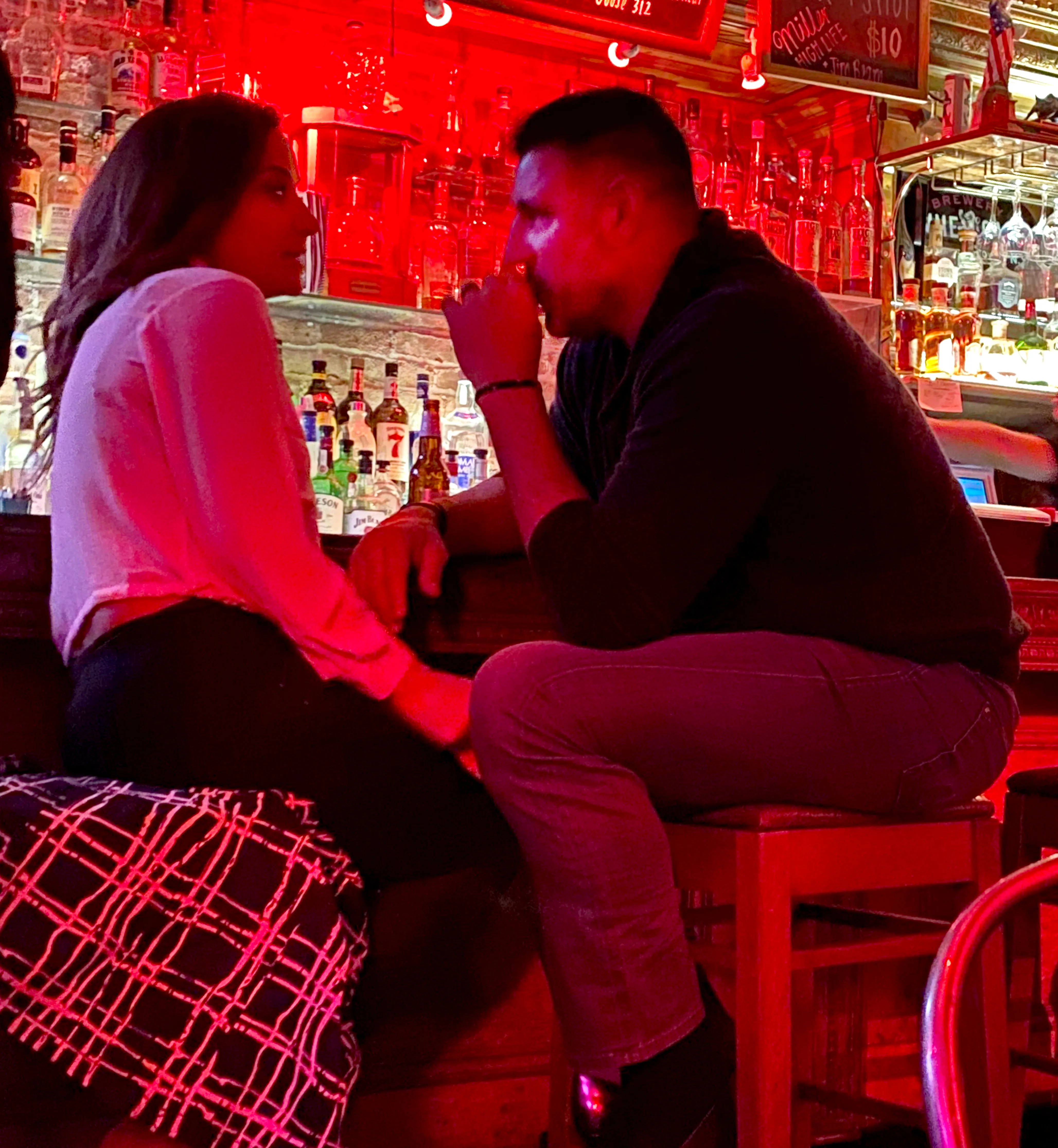 Dianna Russini and Mike Vrabel kissing and chatting at Tribeca Tavern.