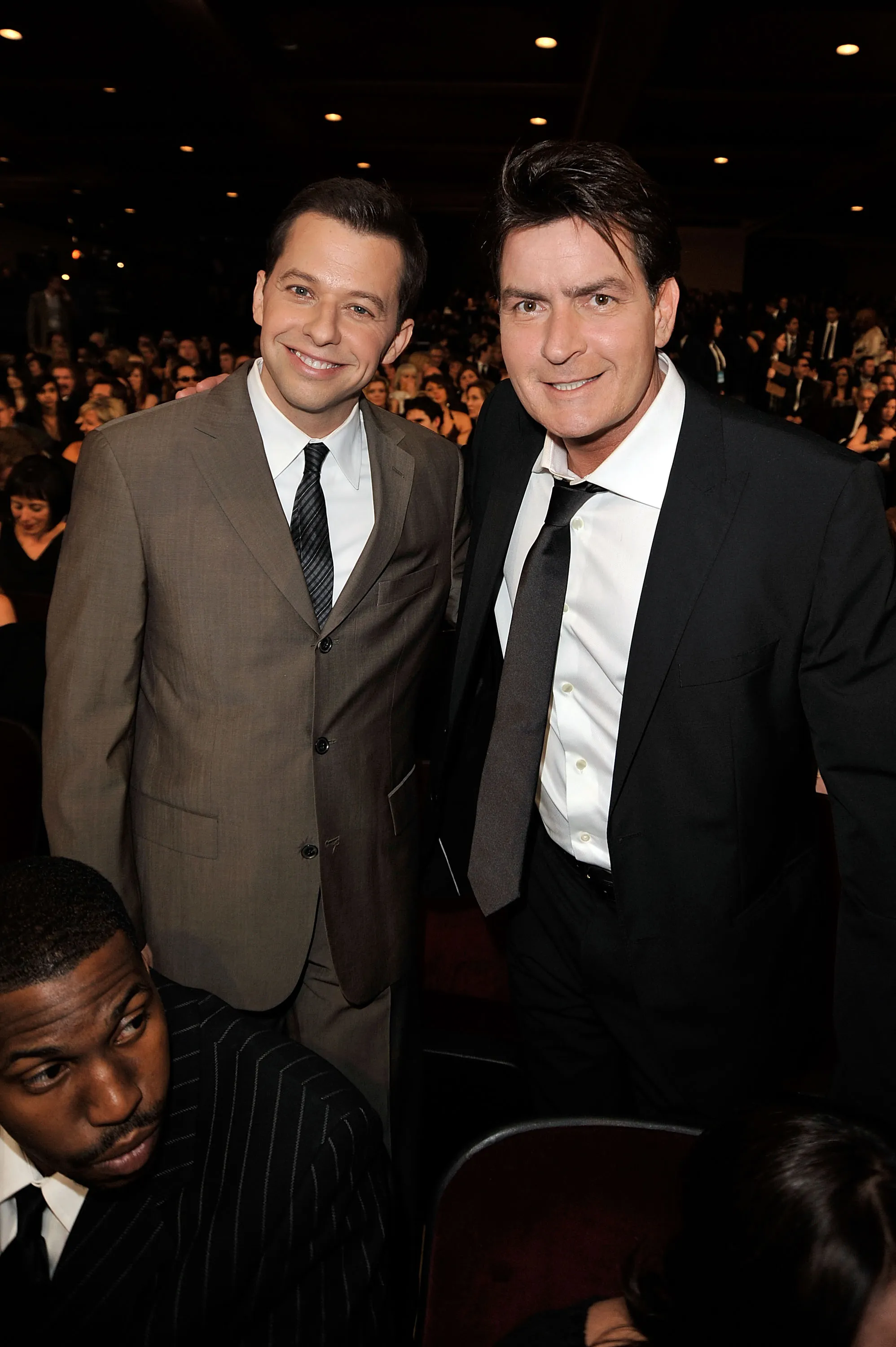 Jon Cryer and Charlie Sheen pose in the audience at the 35th Annual People's Choice Awards.