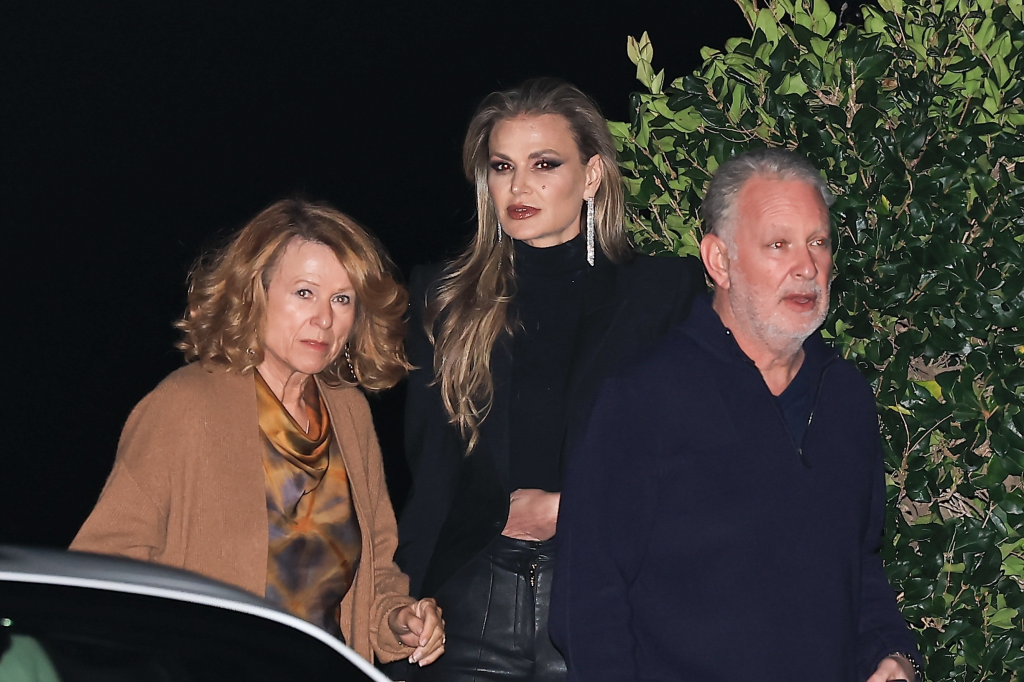 Paul Kemsley and Tatiana Kharchylava leaving Nobu Malibu after a romantic dinner, accompanied by an older woman.