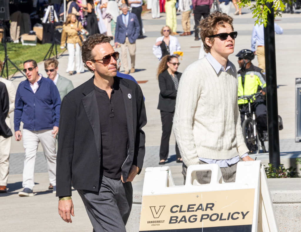 Chris Martin and his son Moses Martin attending Apple Martin's graduation.