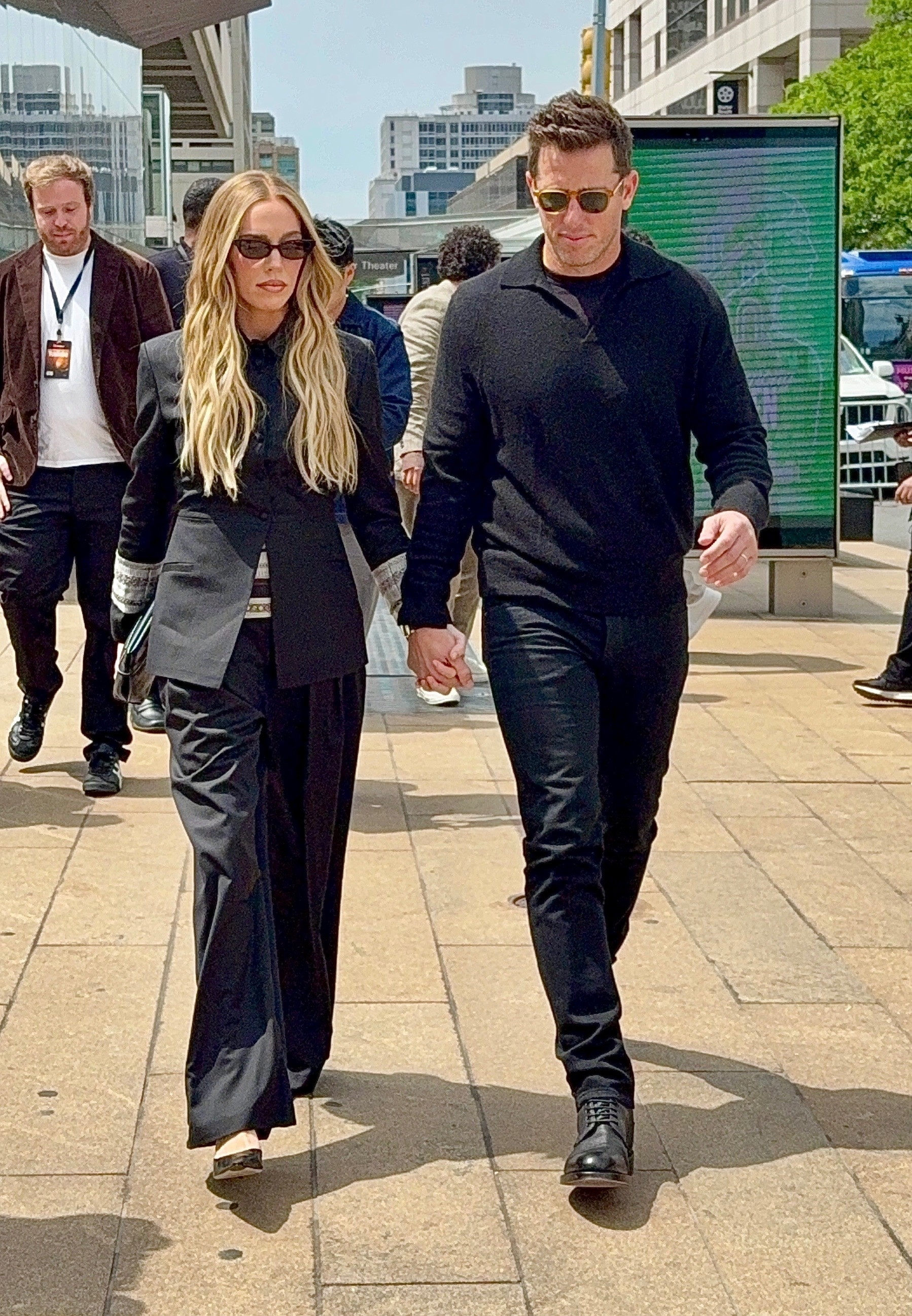 Alexandra Cooper and Matt Kaplan holding hands while walking in New York City.