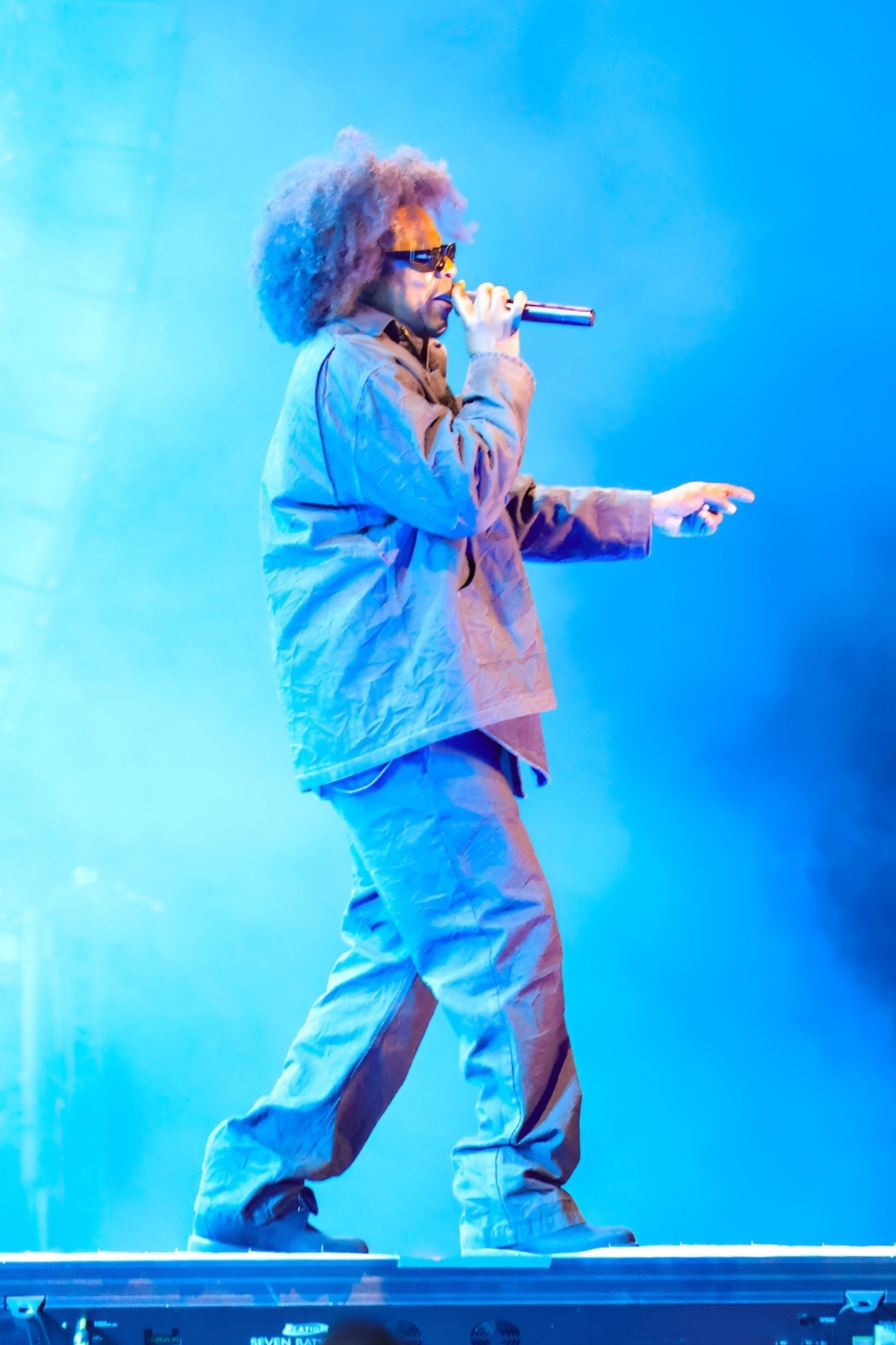 Jay-Z performing at the Roots Picnic Festival with natural hair.
