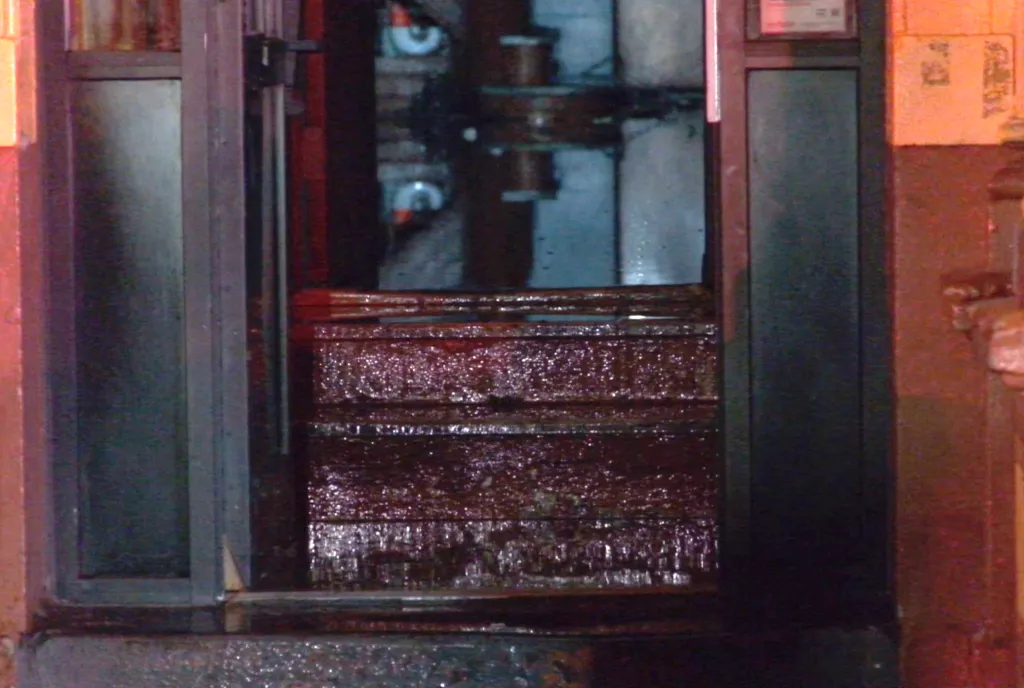 The entrance of 207 Dyckman Street after a fatal fire.