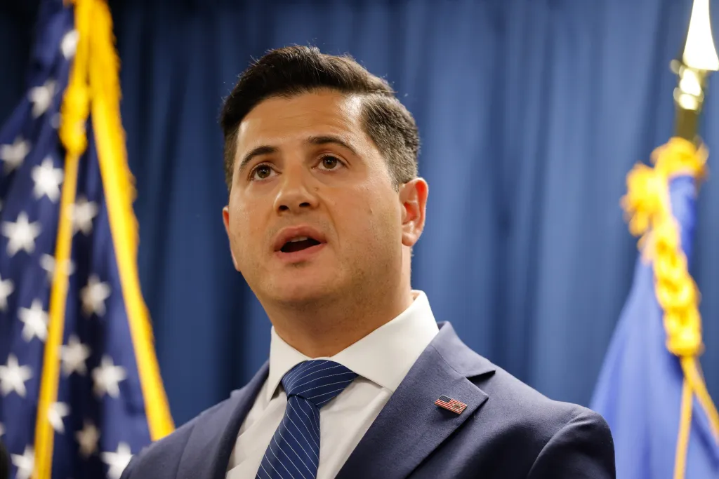 Bill Essayli speaking at a press conference in Santa Ana, California.