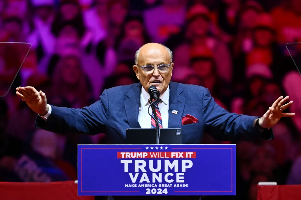 Former Trump lawyer Rudy Giuliani speaks at a campaign rally.