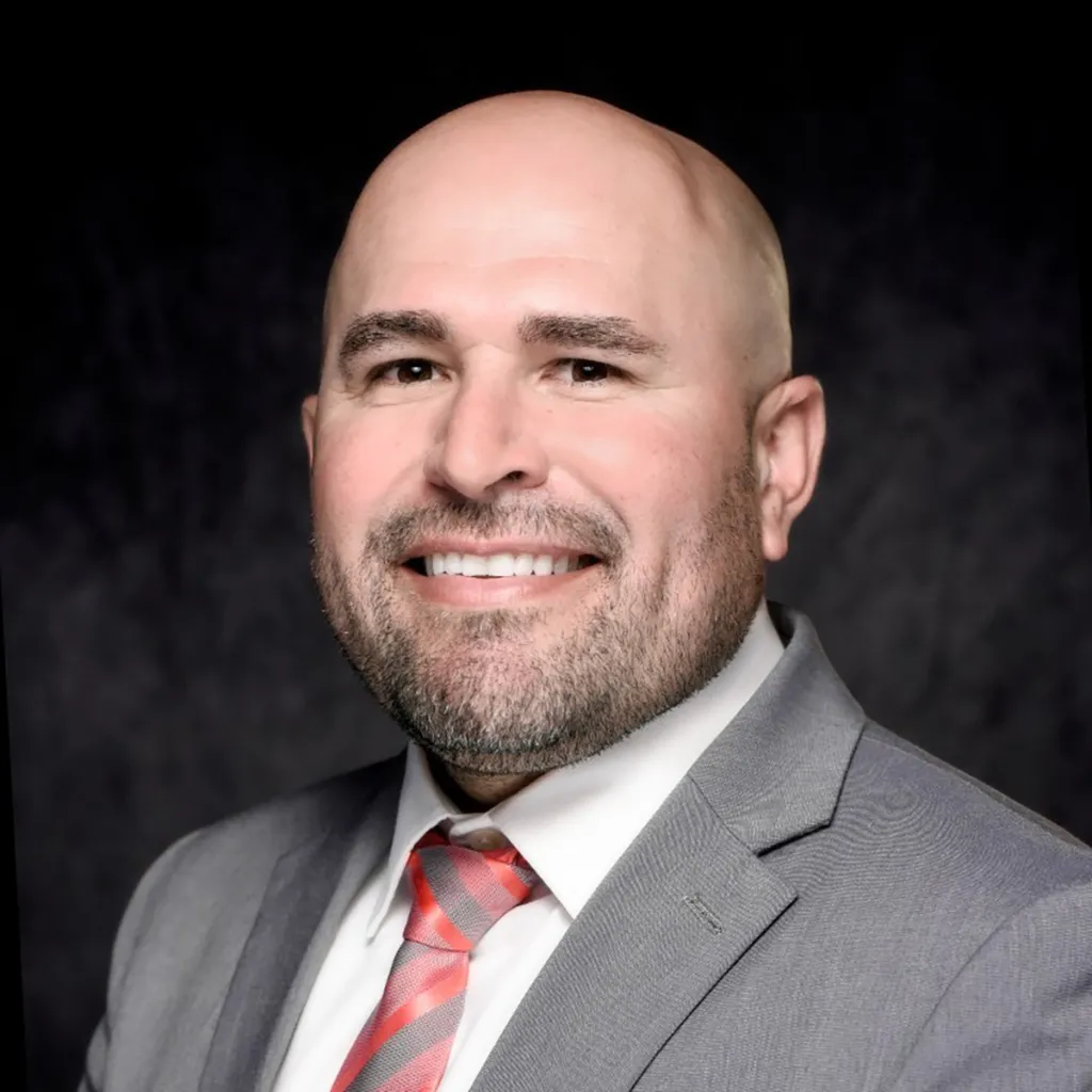 David Chavez, Chief of Human Resources for Fresno Unified School District, smiles.
