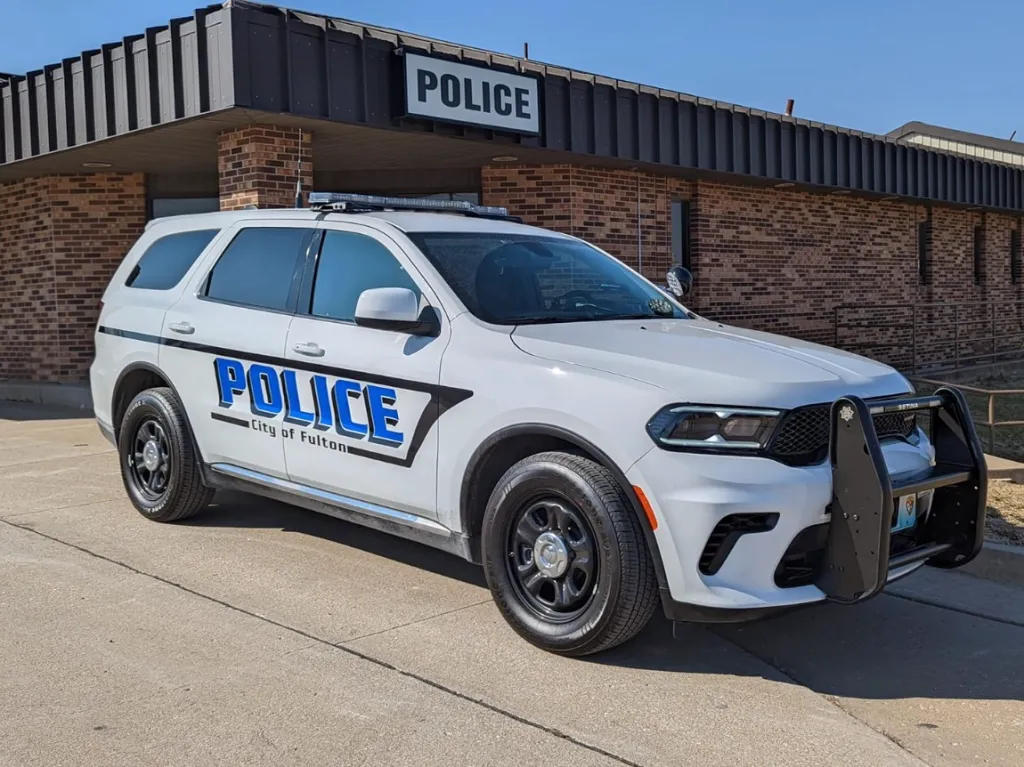 Fulton Police Department vehicle parked outside the police station.