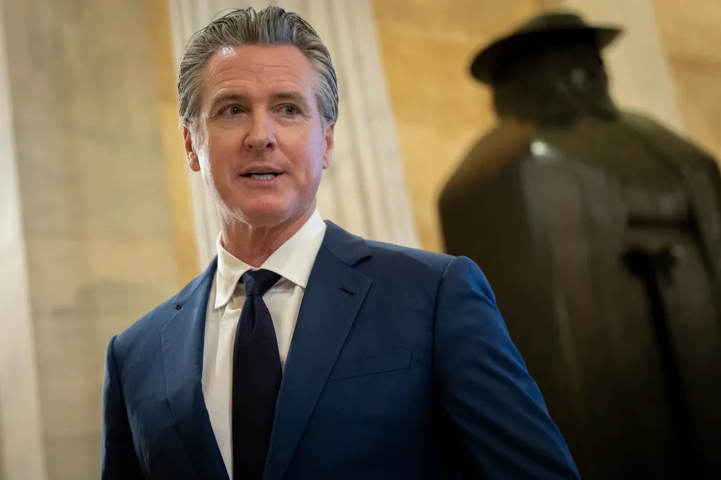 California Governor Gavin Newsom speaking in the U.S. Capitol.