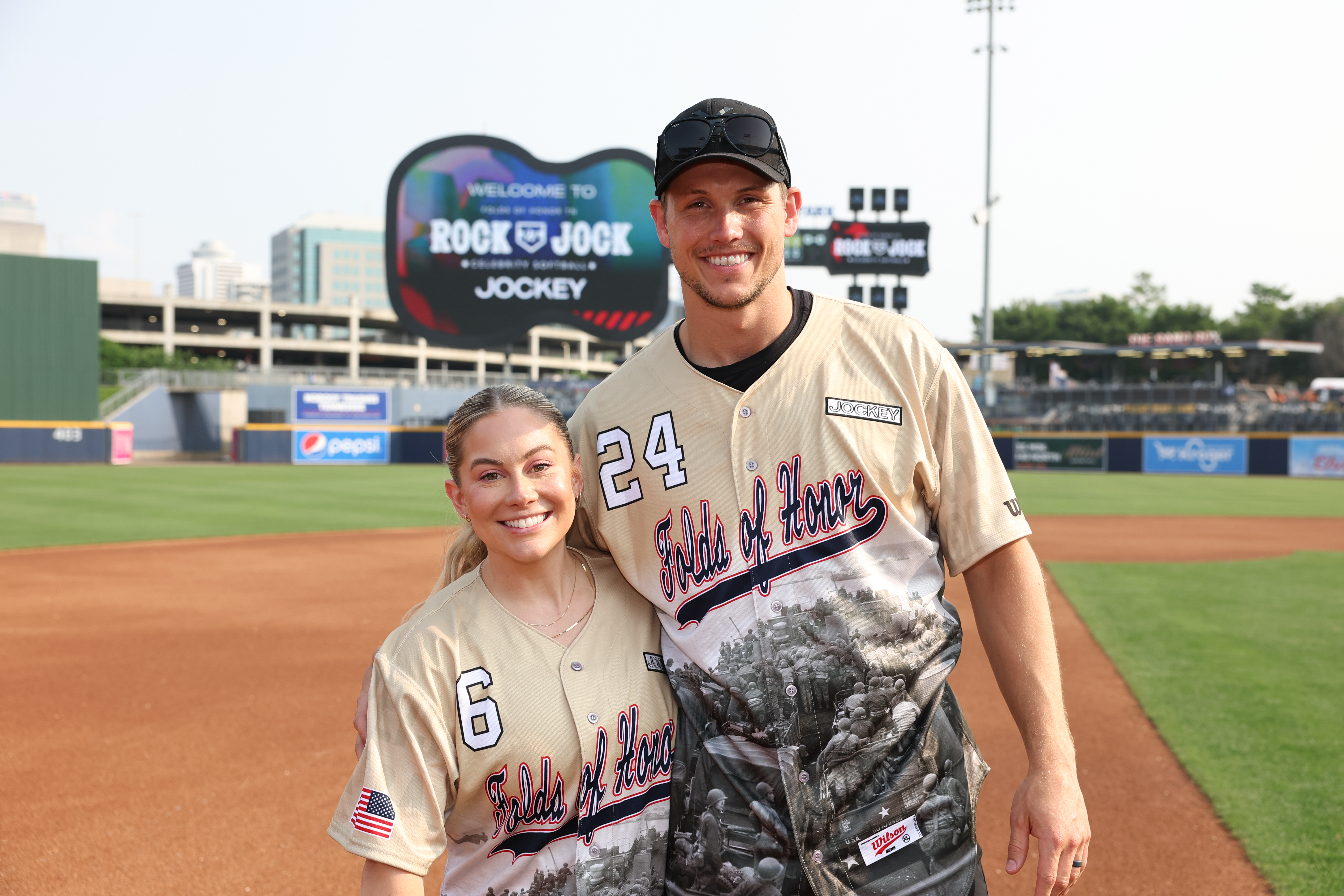 Gymnast Shawn Johnson and husband Andrew East attend the Folds Of Honor Tennessee Rock N' Jock Celebrity Softball Game at First Horizon Park on June 05, 2023 in Nashville, Tennessee.