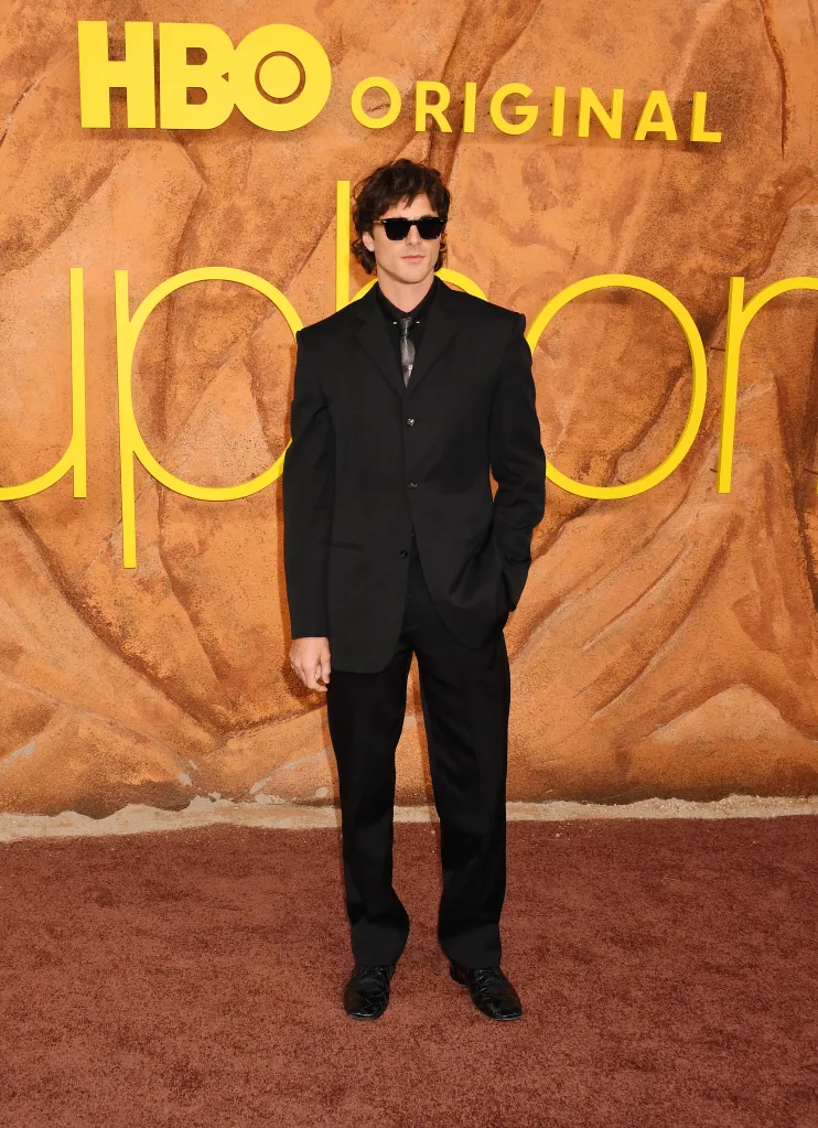 Jacob Elordi wearing a black suit and sunglasses at the Los Angeles Premiere of HBO's Euphoria Season 3.