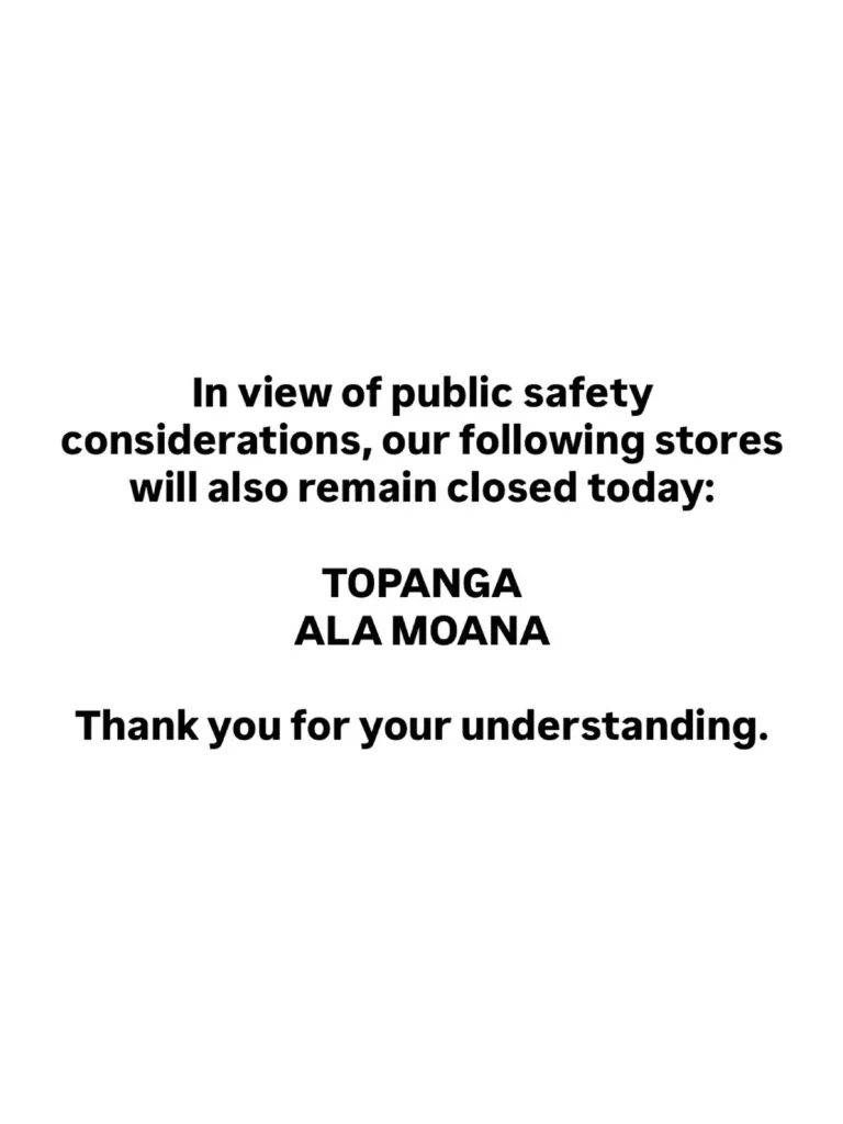 A sign on a white background reads,