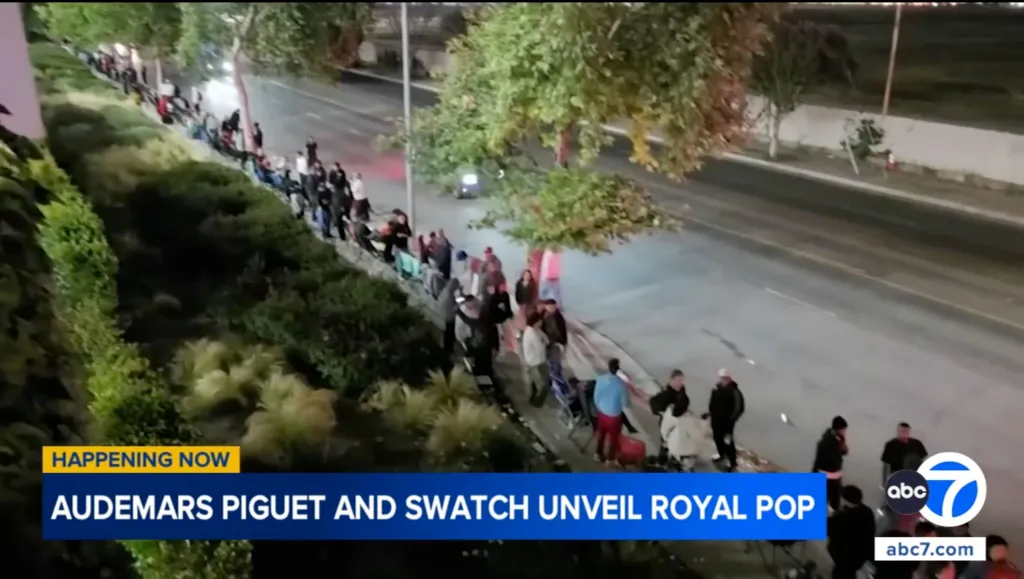 A long line of people waiting outside the Topanga Westfield mall for a new collection of pocket watches.