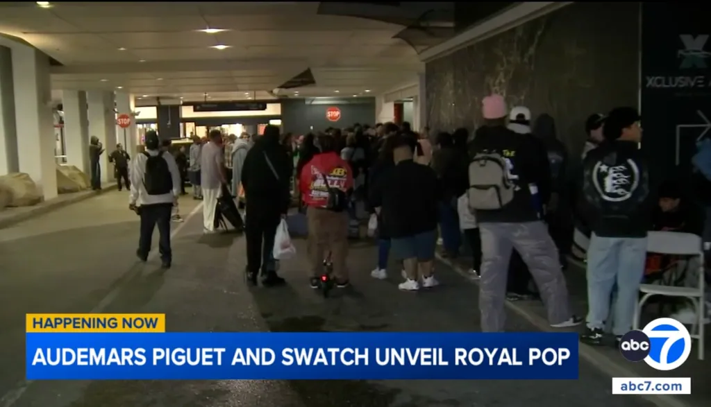 People lining up outside a mall for the Audemars Piguet and Swatch Royal Pop collection.