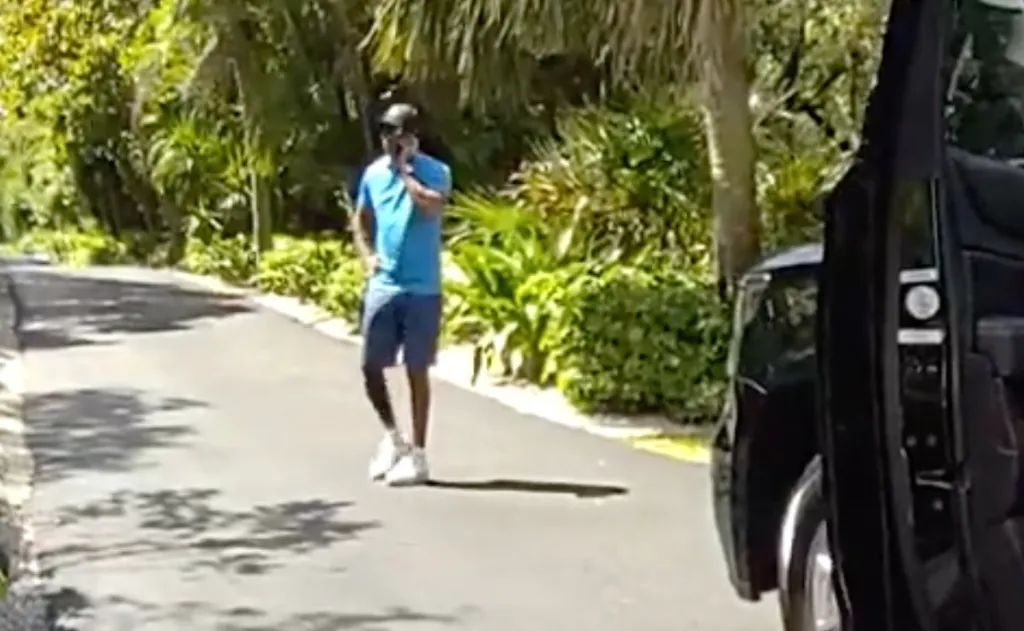 Tiger Woods on a cellphone after a car crash.