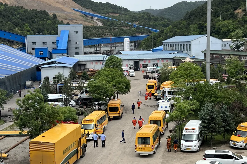 Rescuers work at the site following a gas explosion at Liushenyu coal mine.