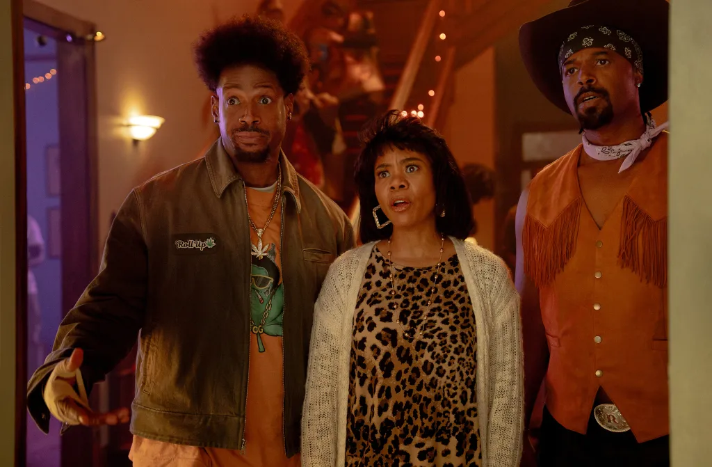 Marlon Wayans, Regina Hall, and Shawn Wayans in a scene from 