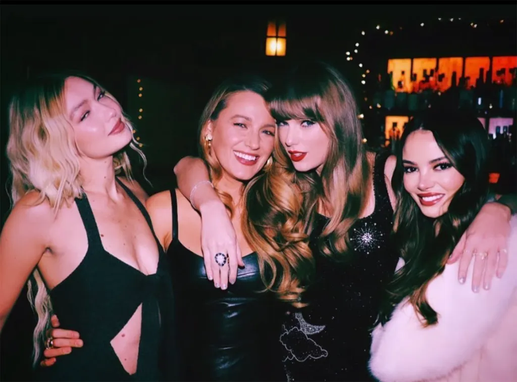 Gigi Hadid, Blake Lively, Taylor Swift, all in black dresses, and Keleigh Sperry, in a white jacket, at Taylor Swift's 34th birthday party.