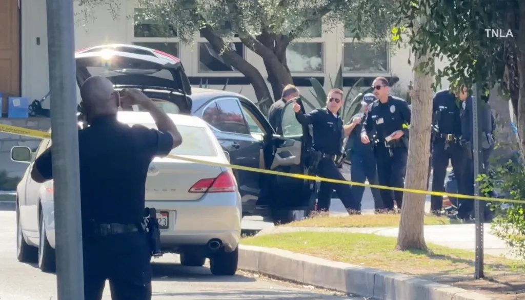 Police officers investigating a child abuse case.