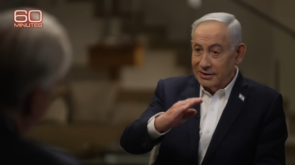 Benjamin Netanyahu talking and gesturing during a 60 Minutes interview.