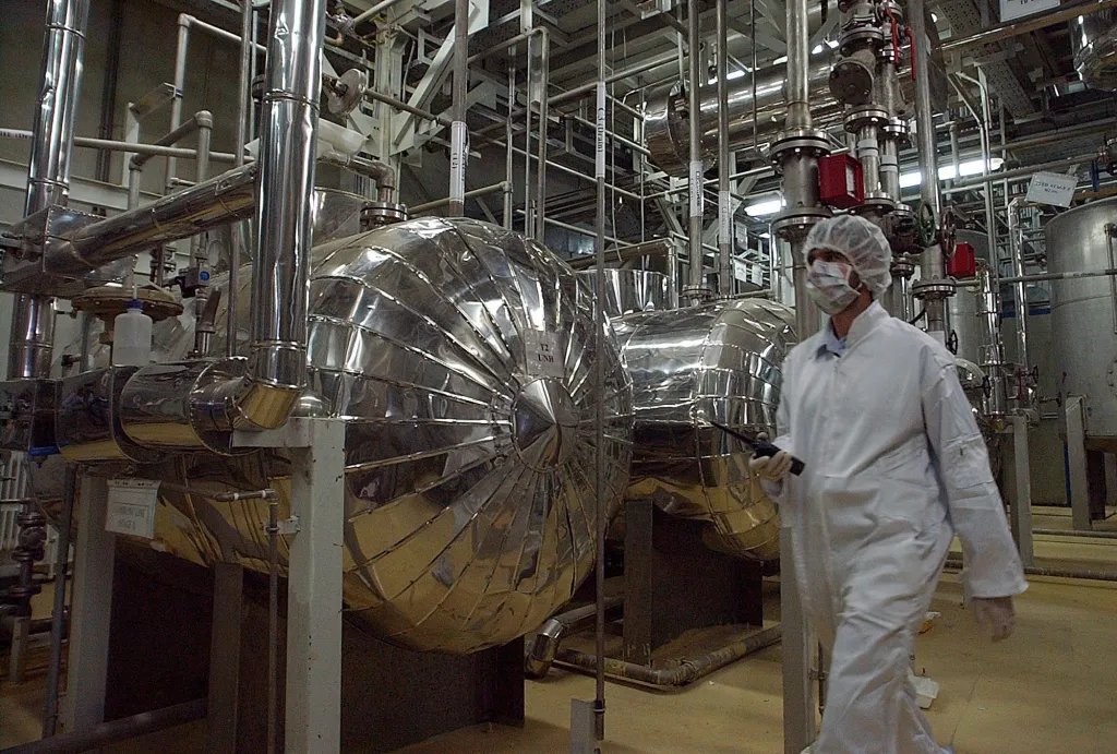 An Iranian official walks through part of the Uranium Conversion Facility outside the city of Isfahan on March 30, 2005.