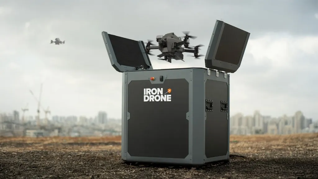 Iron Drone drone system with a drone launching from its container.