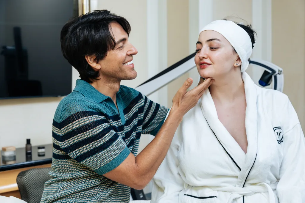 Ivan Pol giving Marissa Martozzo a facial at the Mark Hotel.