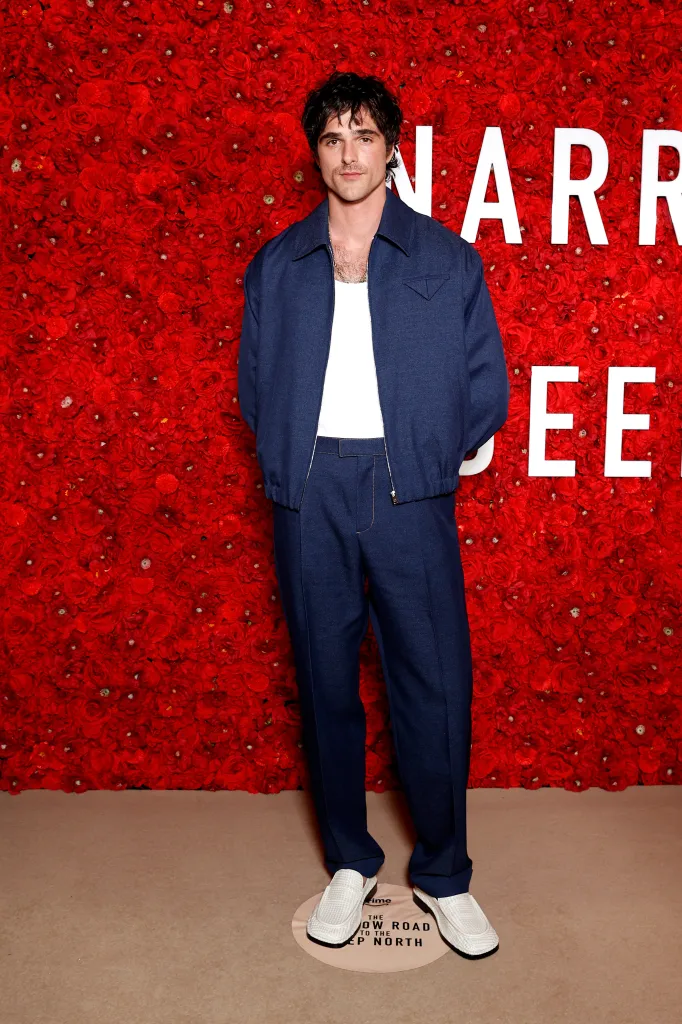 Jacob Elordi in a blue jacket and trousers, posing at the Australian premiere of 