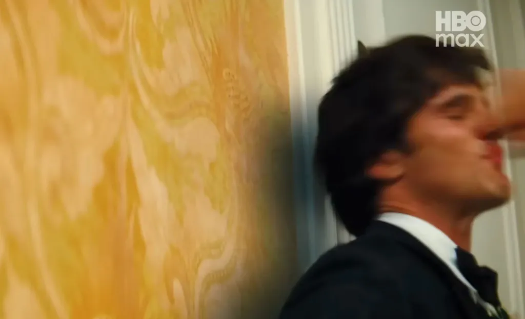 Jacob Elordi from Euphoria being hit or thrown against a wall.