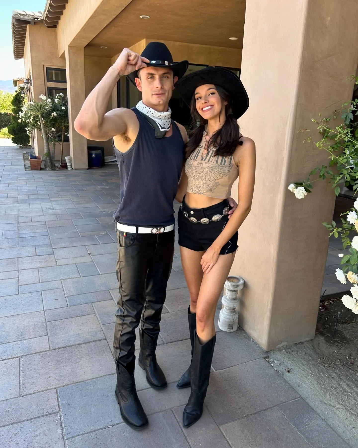 James Kennedy and Ally Lewber in cowboy attire.