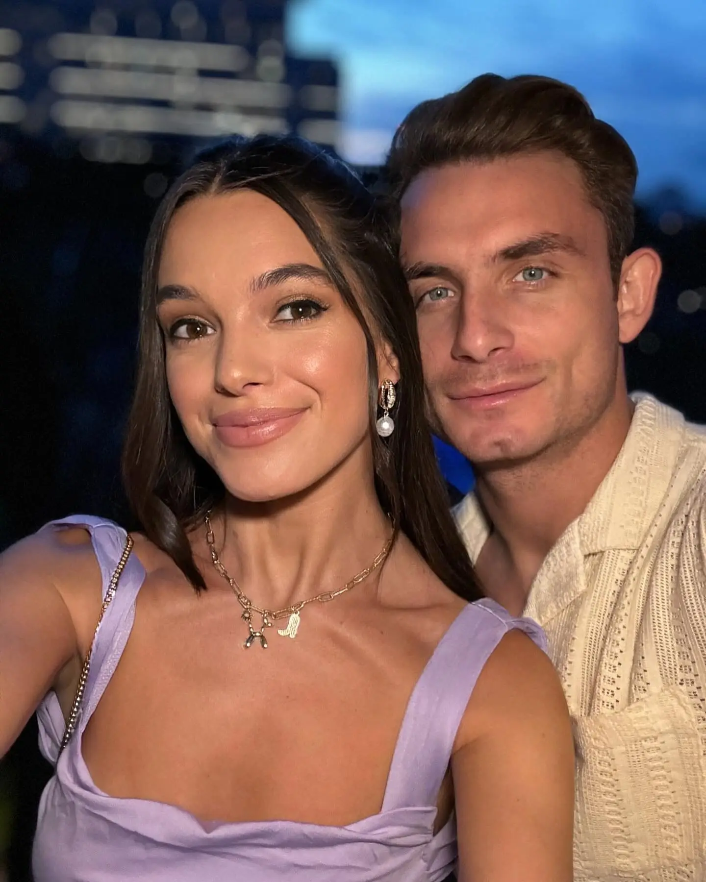 James Kennedy and Ally Lewber posing for a photo.