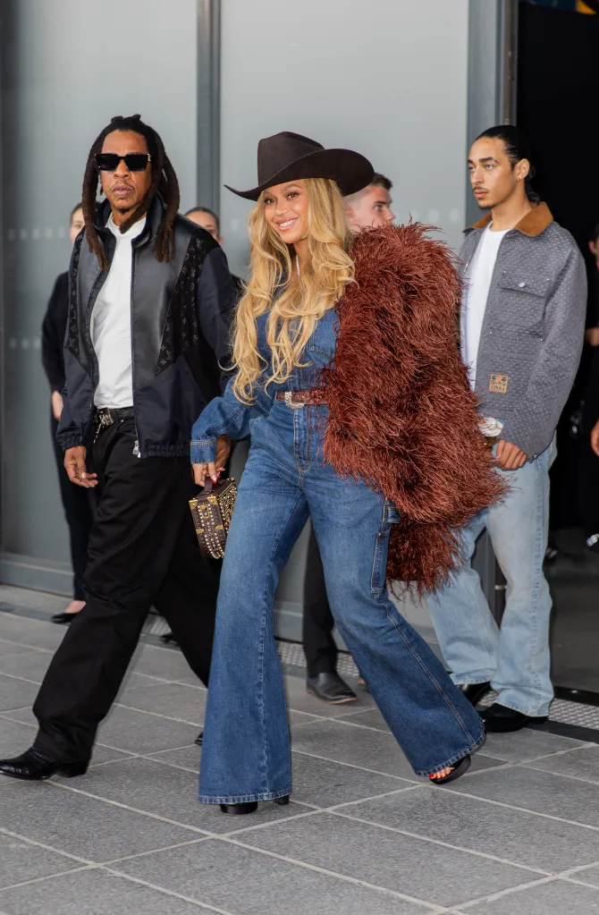 Jay-Z, Beyoncé, and Daniel Julez Smith Jr. walking at Paris Fashion Week.