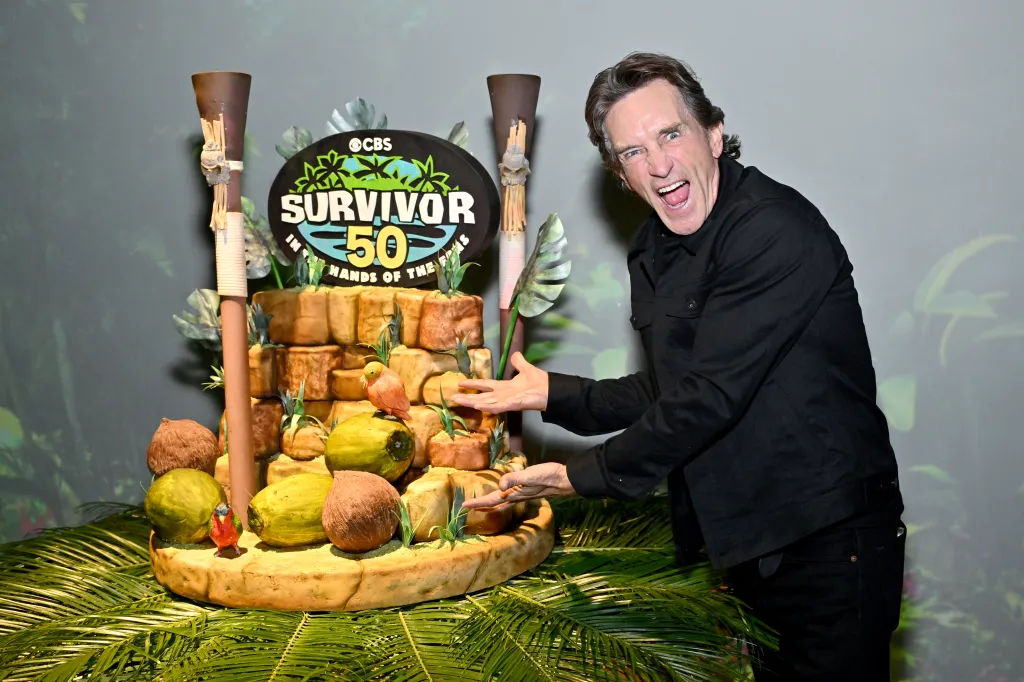 Jeff Probst with an excited expression next to a 