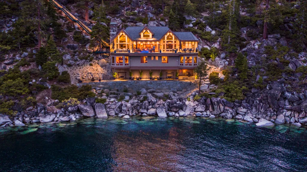 Luxurious house on Lake Tahoe at twilight.